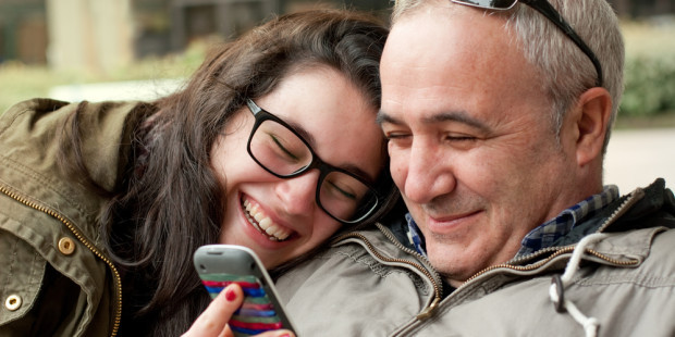 web3-teenager-girl-dad-smartphone-asifeshutterstock