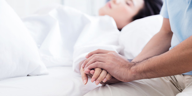 web3-sick-woman-hospital-bed-care-shutterstock (1)