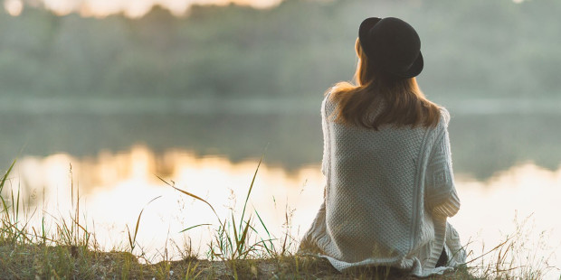 web3-woman-outside-thinking-sunset-alone-reflexive-shutterstock_659491051-egor-fomin-ai