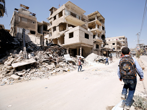 rua-danificada-siria-REUTERS-Omar-Sanadiki