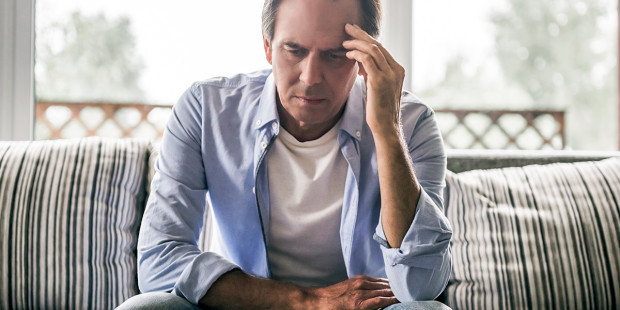 web3-worried-overwhelmed-man-upset-sad-home-shutterstock_743864305