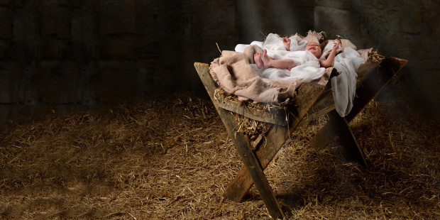 WEB3-BABY-JESUS-CRESCHE-NATIVITY-MANGER-HAY-Shutterstock