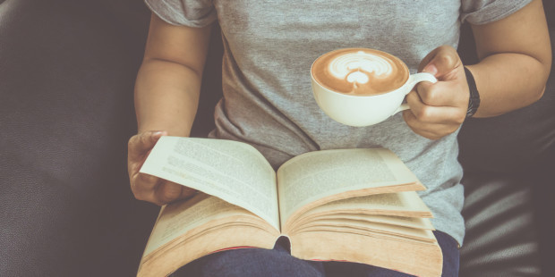 web3-woman-reading-book-coffee-home-shutterstock