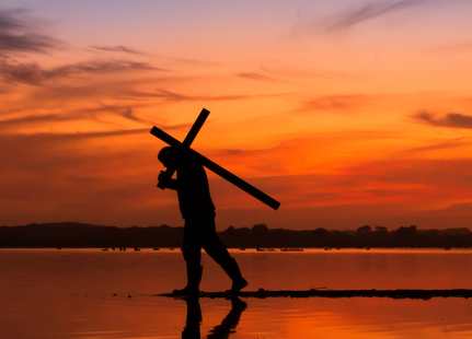 web3-cross-carry-man-sunset-shutterstock