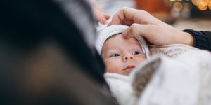 web3-priest-cross-baby-communion-shutterstock-300×150