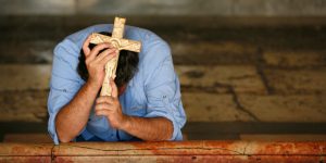 web3-pray-cross-crucifix-man-church-kneel-godong-il252263c-300×150