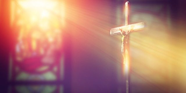 Crucifix,,Jesus,On,The,Cross,In,Church,With,Ray,Of