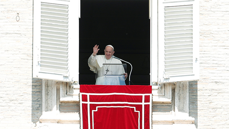 Pope Francis leads the Regina Coeli prayer from his window at St. Peter’s Square