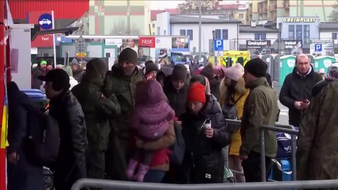 Refugees from Ukraine pour into in Polish camp close to border