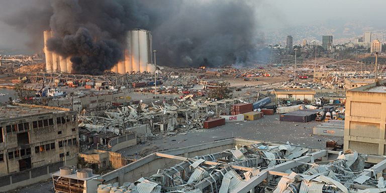 Smoke rises from the site of an explosion in Beirut